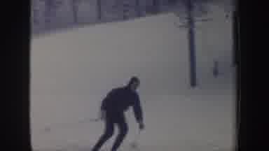 New Hampshire (1962): Man Skiing Down Next To Snowy Pine Trees During A Winter Ski