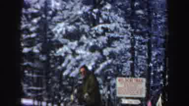 New Hampshire (1962): Man Skis Down A Mountain Through The Forest With A Dark