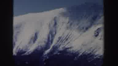 New Hampshire (1962): View Of Snow Covered Mountains Blue Sky And White Clouds On