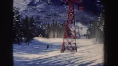 New Hampshire (1962): A Man Skis Between Trees Down A Snowy Hill