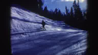 New Hampshire (1962): Person Wearing Green Jacket And White Hat Skis Downhill On A