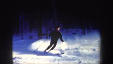New Hampshire (1962): A Person Skiing Quickly Down A Small Slope Before Stopping