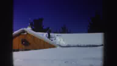 New Hampshire (1962): A Man Clearing The Ice That Have Gathered On A House