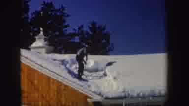 New Hampshire (1962): Man Shovels Snow From Roof House Winter Cold Sunny Film Old