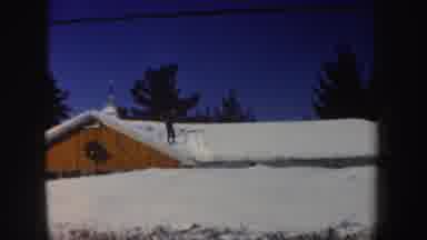 New Hampshire (1962): Person Wearing Jacket And Hat Steadily Shoveling Snow Off Of