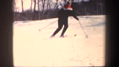 New Hampshire (1962): A Man Is Jet skiing On An Icy Land Surrounded By Thick Short