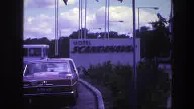 Copenhagen Denmark (1975): A Red Vintage Car Parked In Front Of A Hotel Called