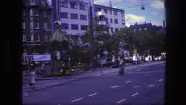 Copenhagen Denmark (1975): A Wide Avenue Full Of Cars And Trucks With People