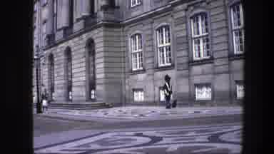 Copenhagen Denmark (1975): A Royal Guard Patrols Outside A Building During Day