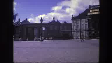 Copenhagen Denmark (1975): It's Day Time And At A Monument Setting People Roam The