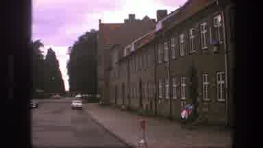 Copenhagen Denmark (1975): A Old Time Suburb View Of Traffic Passing Down A Road