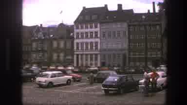 Copenhagen Denmark (1975): People Lounge In A Busy Parking Lot