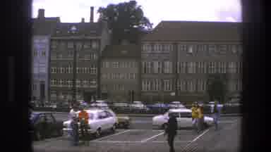 Copenhagen Denmark (1975): A Camera Pans From A Parking Lot To The Steps Of S City