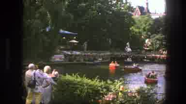 Copenhagen Denmark (1975): People Watching Boats Speeding Around In A Pool