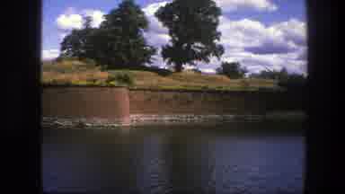Copenhagen Denmark (1975): A Wall Encloses A Body Of Water Surrounded By A Grass