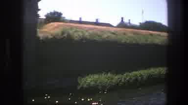 Copenhagen Denmark (1975): The Side Of A River Bank With A Small Town In The