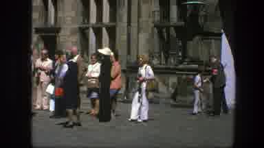 Copenhagen Denmark (1975): Man Wearing White Sweater Stands Near Dark Gray