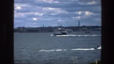 Copenhagen Denmark (1975): A Man Walking Alone Watching Canoe Rides Having Fun On