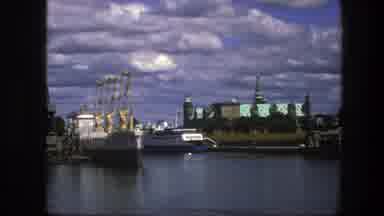 Copenhagen Denmark (1975): Two Large Boats Sitting At A Dock In A Large Body Of