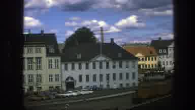 Copenhagen Denmark (1975): View Of White And Tan Buildings With Blue Sky And White