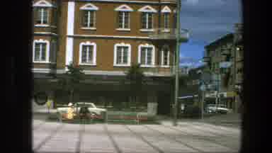 Copenhagen Denmark (1975): A Big Building After A Girl Saying Hi With Her Hand