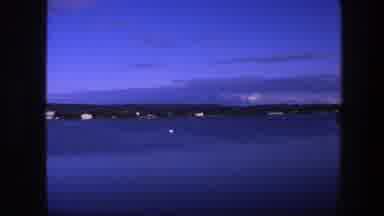 Copenhagen Denmark (1975): View Of Lone Duck Swimming In Water On A Clear Evening