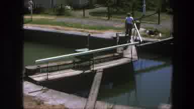 Copenhagen Denmark (1975): Man Crosses A Small Bridge Over A Water Treatment Plant