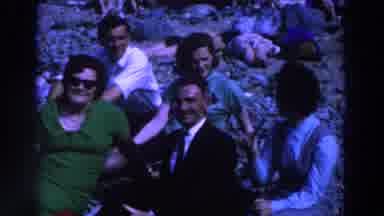 Ireland-1961: Group Of People Relaxing On Rocky Beach