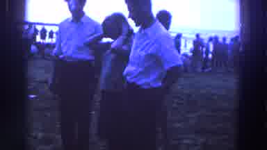 Ireland (1961): A Lot Of People At A Beach But Three People Watching To A Little