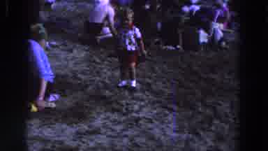 Ireland (1961): A Lot Of People Pitted At A Beach And A Little Girl With Some Toy