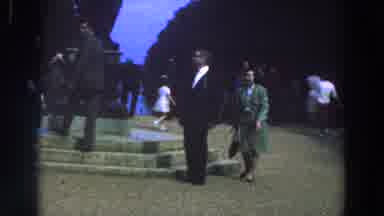 Ireland (1961): A Crowd Of Well Dressed People Stand Around And On The Steps Of A