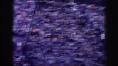 Nebraska (1957): A Multitude Of People Gather Together In A Stadium Watching Some