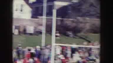 Nebraska (1957): Football Players Are Competing Against Each Other While Crowd