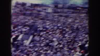 Nebraska (1957): A Crowd Gathered During A Rally As Entertainers Dressed In Yellow