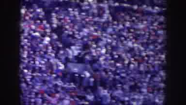 Nebraska (1957): Fans Fill Stadium Bleachers With Trees Surrounding The Stadium On
