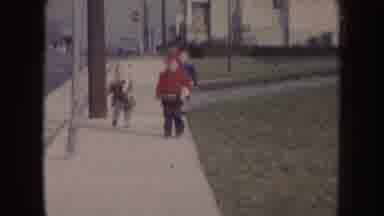 Nebraska (1957): Three Kids In Sweat Jackets Walking Along A Lane And Playing