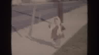 Nebraska (1957): Two Little Kids Running While Another One Watches It All