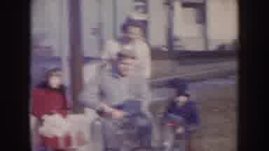 Nebraska (1957): Family Going Outside With Two Children Running And Playing