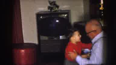 Nebraska (1957): Grandfather Proudly Watches On From His Chair As A Young Boy