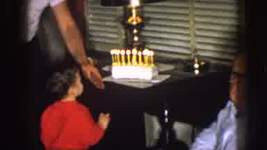 Nebraska (1957): A Little Boy Is Held From Coming Close To Lit Candles On The
