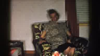 Nebraska (1957): Pan Around A Room Of Adults Sitting On Floral Chairs And Couches