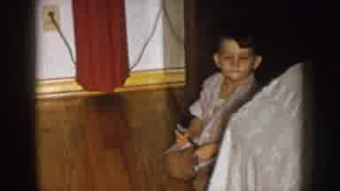 Nebraska (1957): A Kid Plays Around The House With His Knees On The Floor
