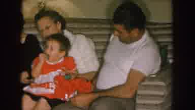 Nebraska (1957): Entire Family Sitting On The Sofa