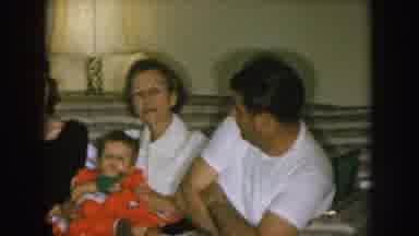 Nebraska (1957): Family During The Christmas Season With Many Presents In Front Of