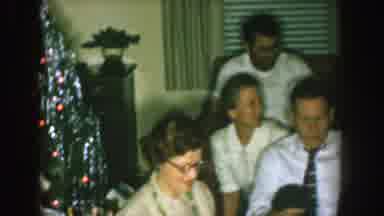 Nebraska (1957): A Well Dressed And Cheerful White Family Gathers Around A