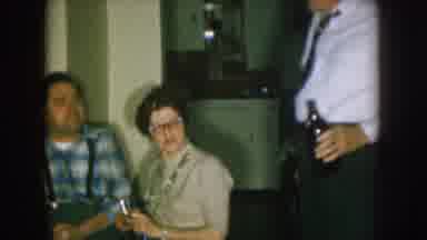 Nebraska (1957): Several People Standing And Sitting In A Room Drinking Beer &