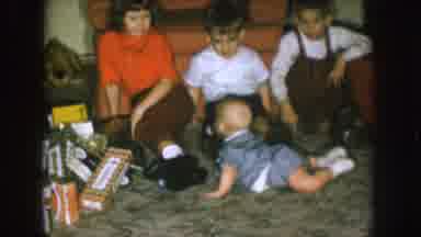 Nebraska (1957): Infant Baby Crawls On The Floor Next To Presents To Brothers And