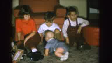 Nebraska (1957): Older Siblings Watch As Baby Sibling Struggles To Go To Them On