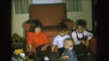 Nebraska (1957): Four Very Small Children Sitting On The Floor Next To The Sofa