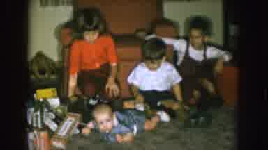 Nebraska (1957): Four Small Kids Are Seen Playing With A Couch On The Background